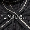 Antik diş rengi ve kemik şerit detaylarıyla zarif bir görünüm sunan kaliteli fermuar.